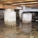 water in kruipruimte ondanks aanwezige ventilatieroosters.